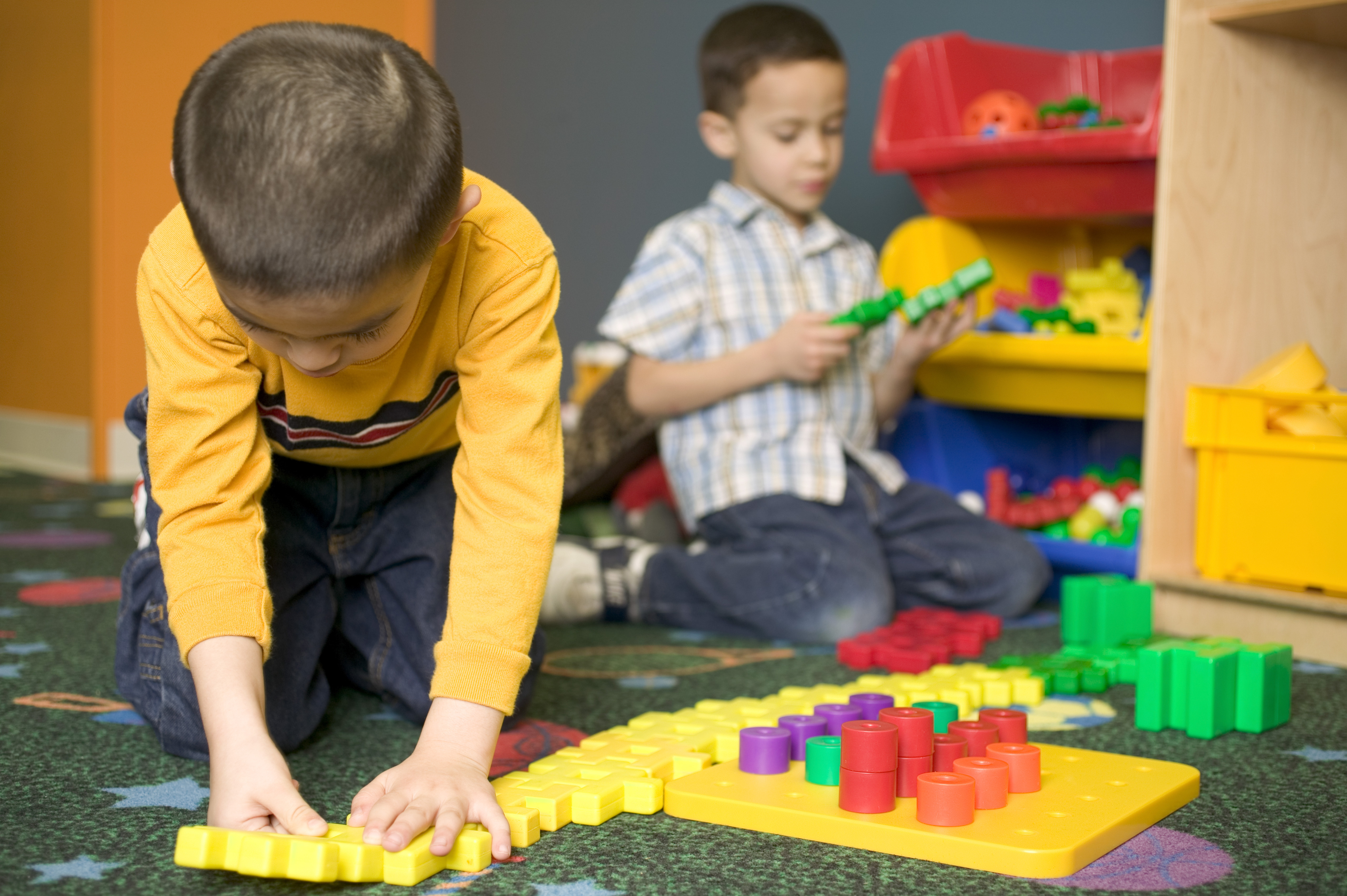 Boys playing with toys