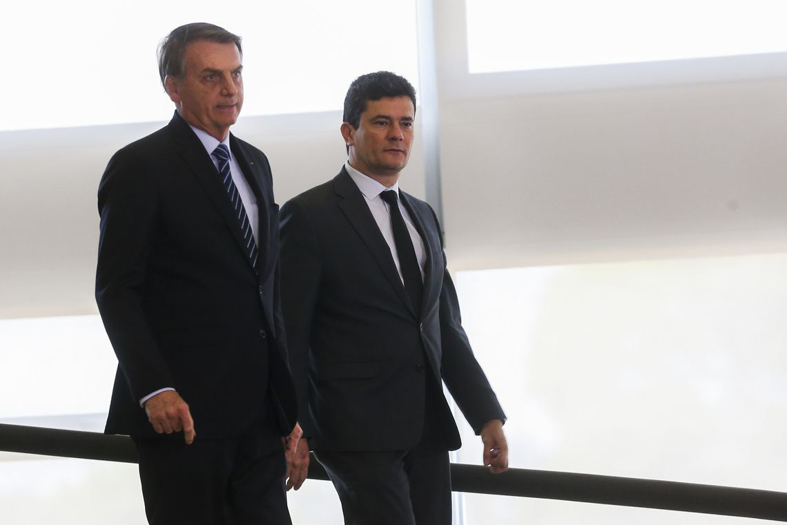 O presidente Jair Bolsonaro e o ministro da Justiça e Segurança Pública, Sergio Moro (Foto: Antonio Cruz/ Ag. Brasil)