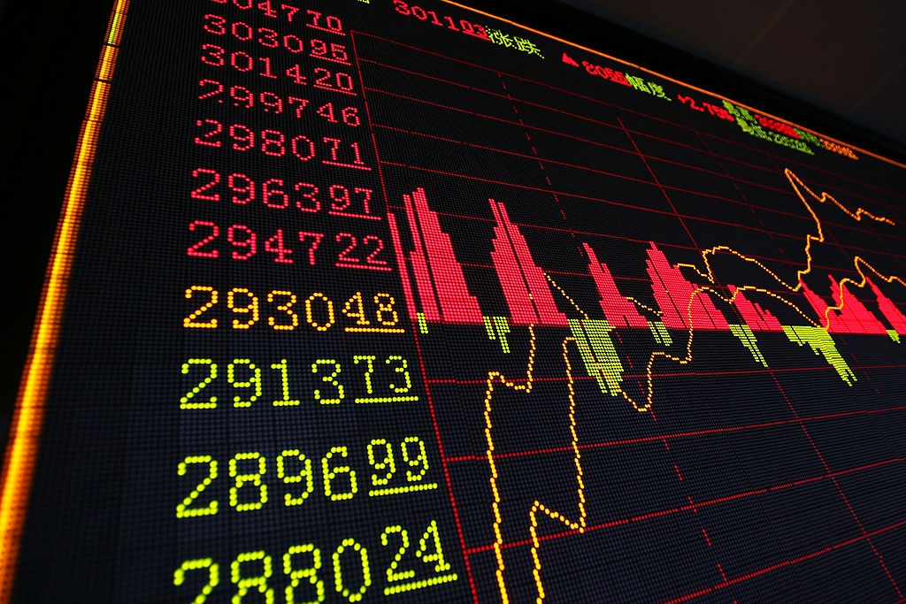 BEIJING, CHINA - MARCH 19: (CHINA OUT) Stock index is seen on a display screen at a securities company on March 19, 2007 in Beijing, China. The Shanghai Composite Index, the most widely followed indicator of the Chinese stock market, rose 2.87 percent today to close at 3,014.44 points, after the People's Bank of China (PBOC) raised interest rates by 0.27 percent on March 18.. (Photo by China Photos/Getty Images)
