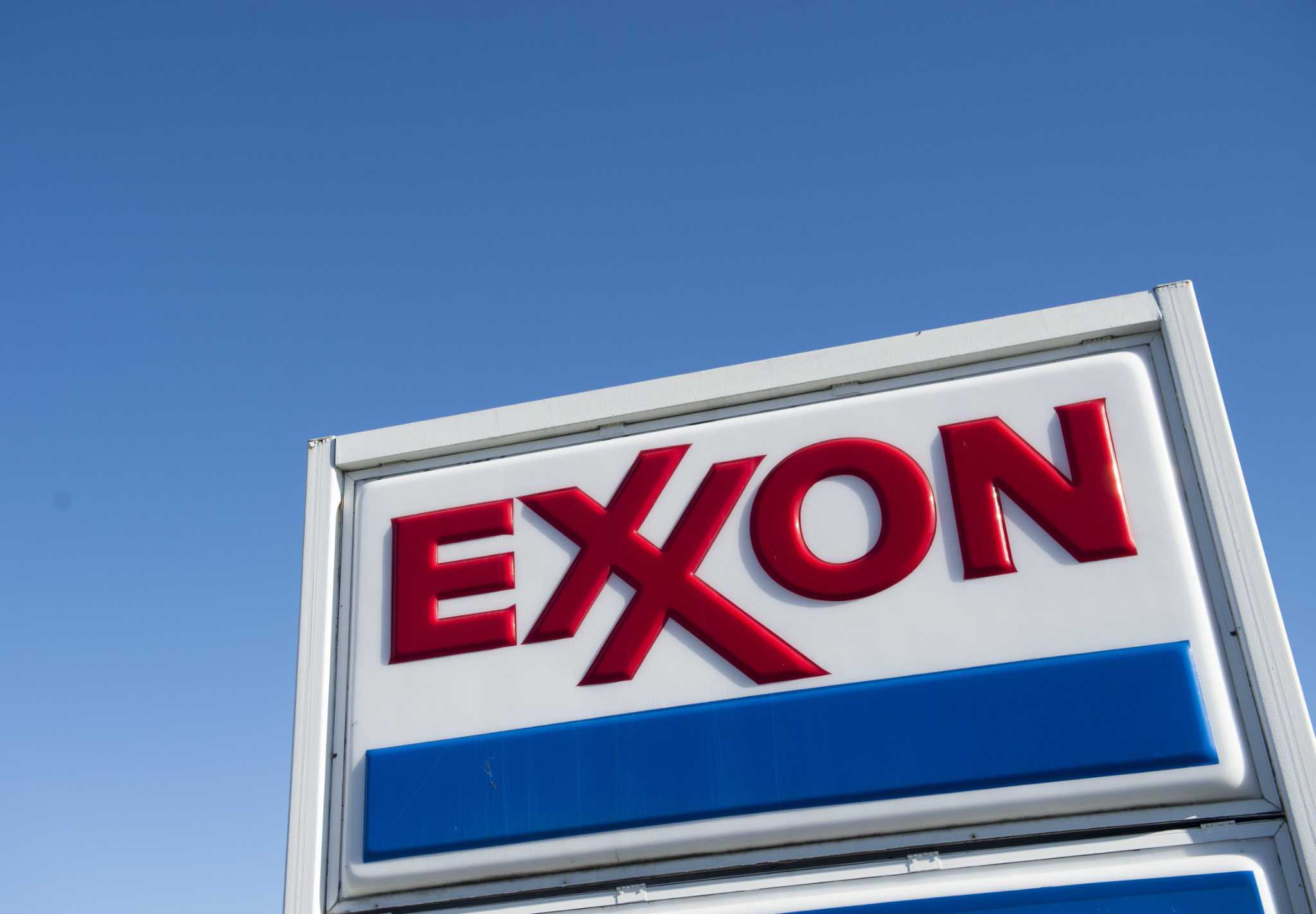 (FILES) In this file photo taken on January 5, 2016 An Exxon gas station is seen in Woodbridge, Virginia. - Exxon Mobil reported a second-quarter loss July 31, 2020, joining other petroleum giants in suffering the hit from lower oil prices due to crashing demand amid the coronavirus pandemic. (Photo by Saul LOEB / AFP) (Photo by SAUL LOEB/AFP via Getty Images)