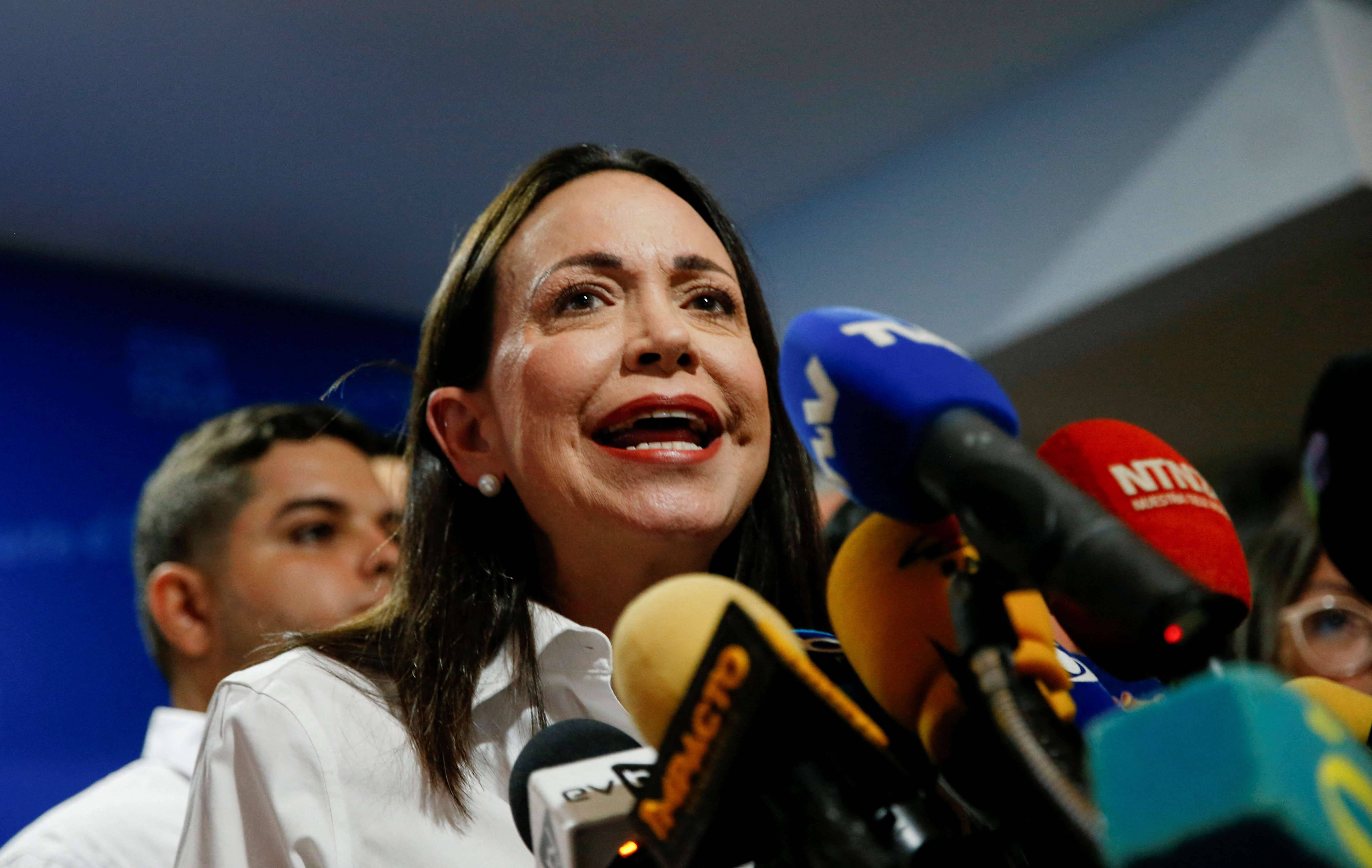 Líder da oposição venezuelana María Corina Machado fala com jornalistas, em Caracas 20/03/2024 REUTERS/Leonardo Fernandez Viloria