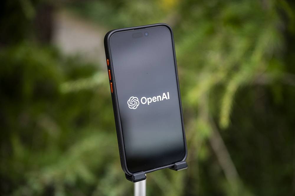 Logotipo da OpenAI em um smartphone (David Paul Morris/Bloomberg)