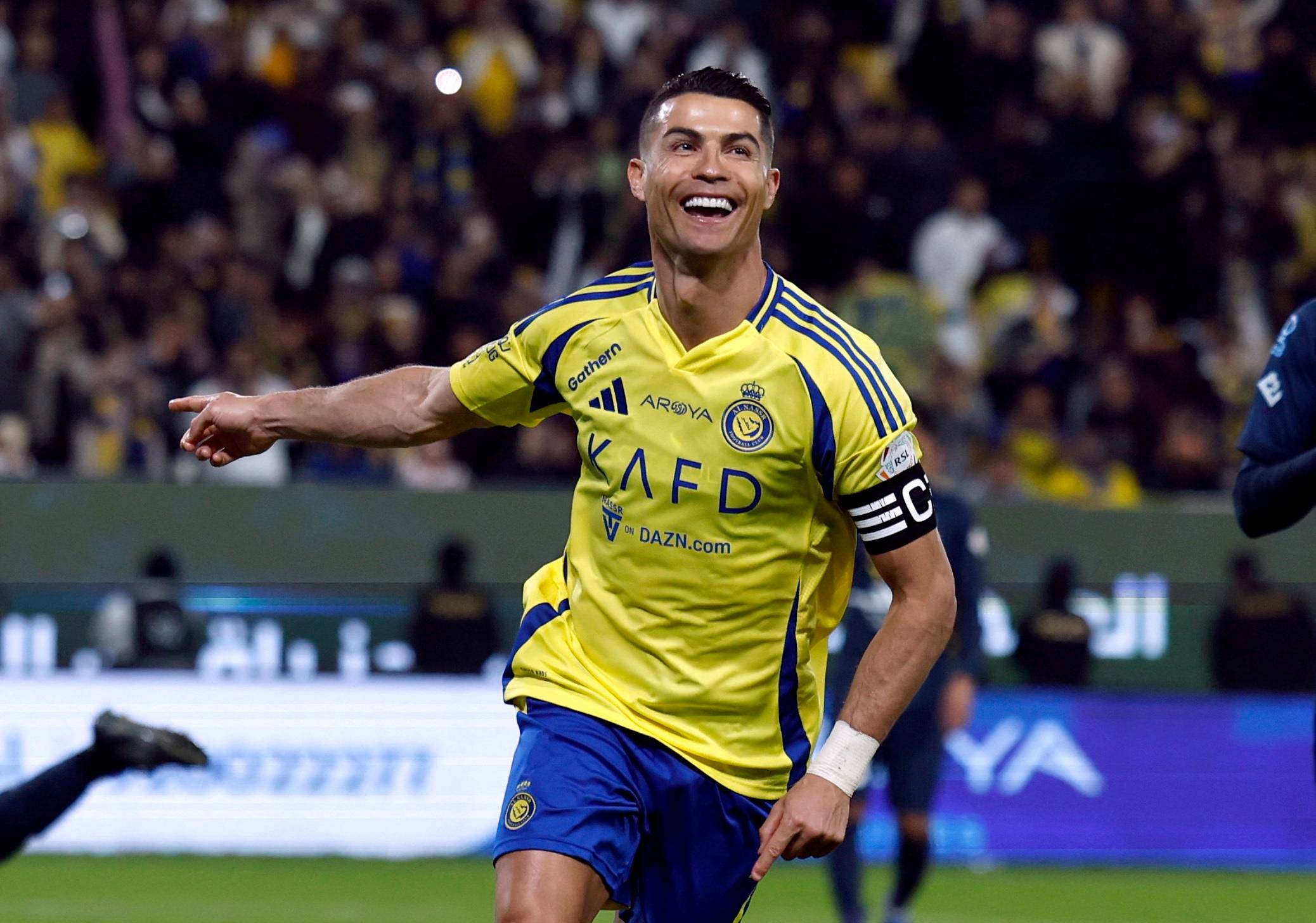 Futebol - Saudi Pro League - Al Nassr x Al Okhdood - Al Awwal Park, Riad, Arábia Saudita - 9 de janeiro de 2025 Cristiano Ronaldo, do Al Nassr, comemora seu segundo gol REUTERS/Hamad I Mohammed