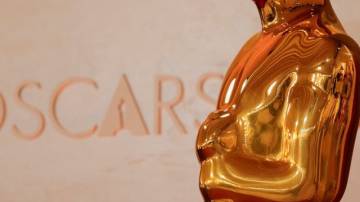 Hollywood Boulevard continues to be transformed into the red carpet arrival area for the 97th Academy Awards, in Los Angeles