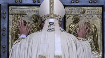 FILE PHOTO: Pope Francis opens the Holy Door to mark opening of the Catholic Holy Year, or Jubilee, in St. Peter's basilica