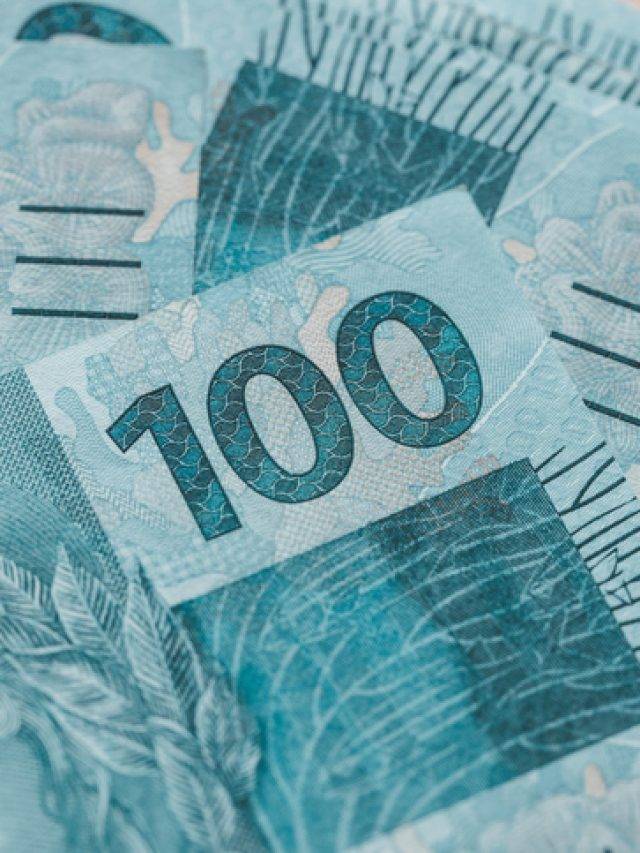 Brazil money, a bundle of 100 reais banknotes, financial concept