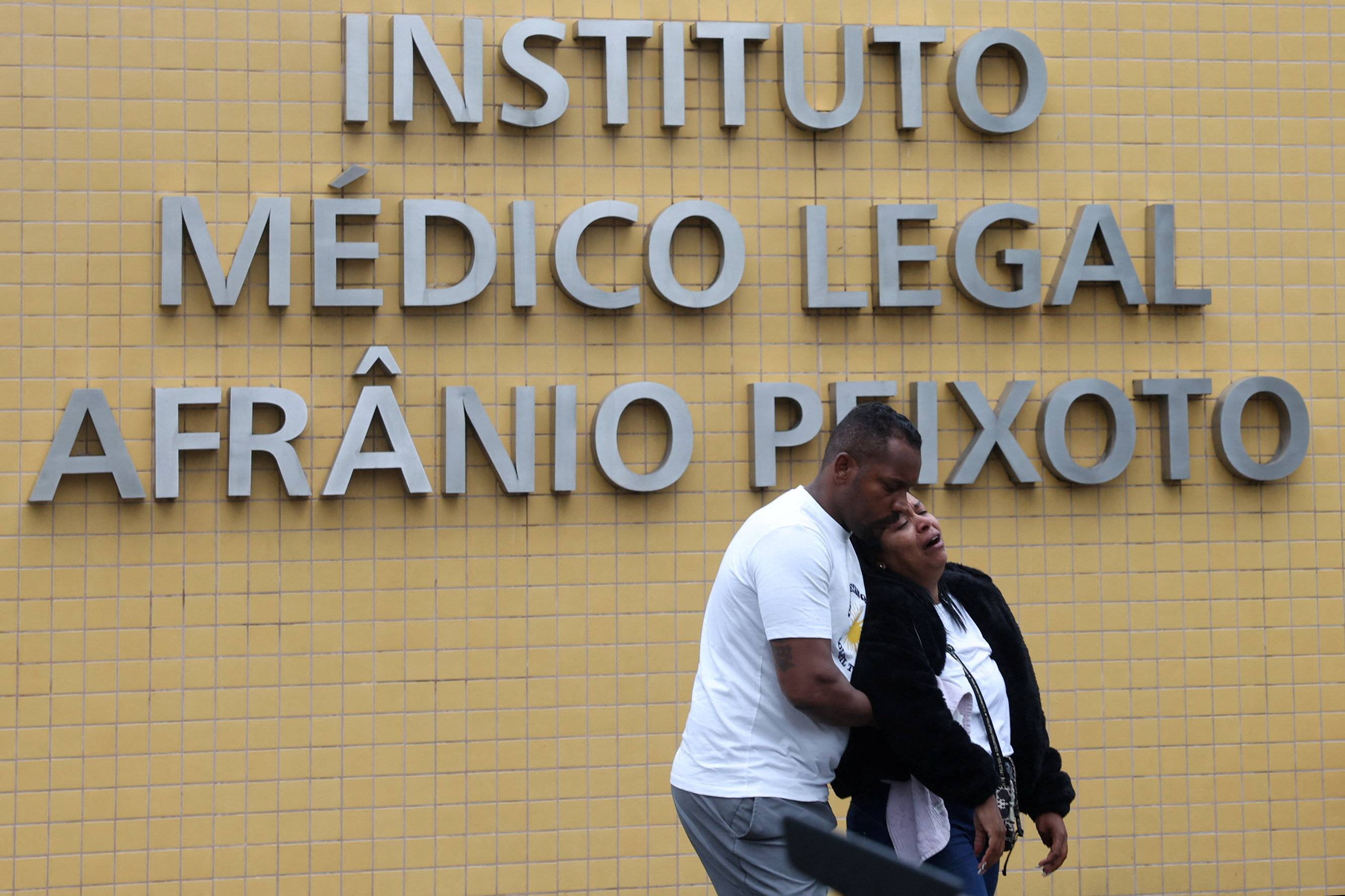 A woman reacts outside a morgue, as relatives of the deceased wait to identify bodies after a deadly police operation against drug trafficking in the favela do Penha, in Rio de Janeiro, Brazil October 31, 2025. REUTERS/Pilar Olivares