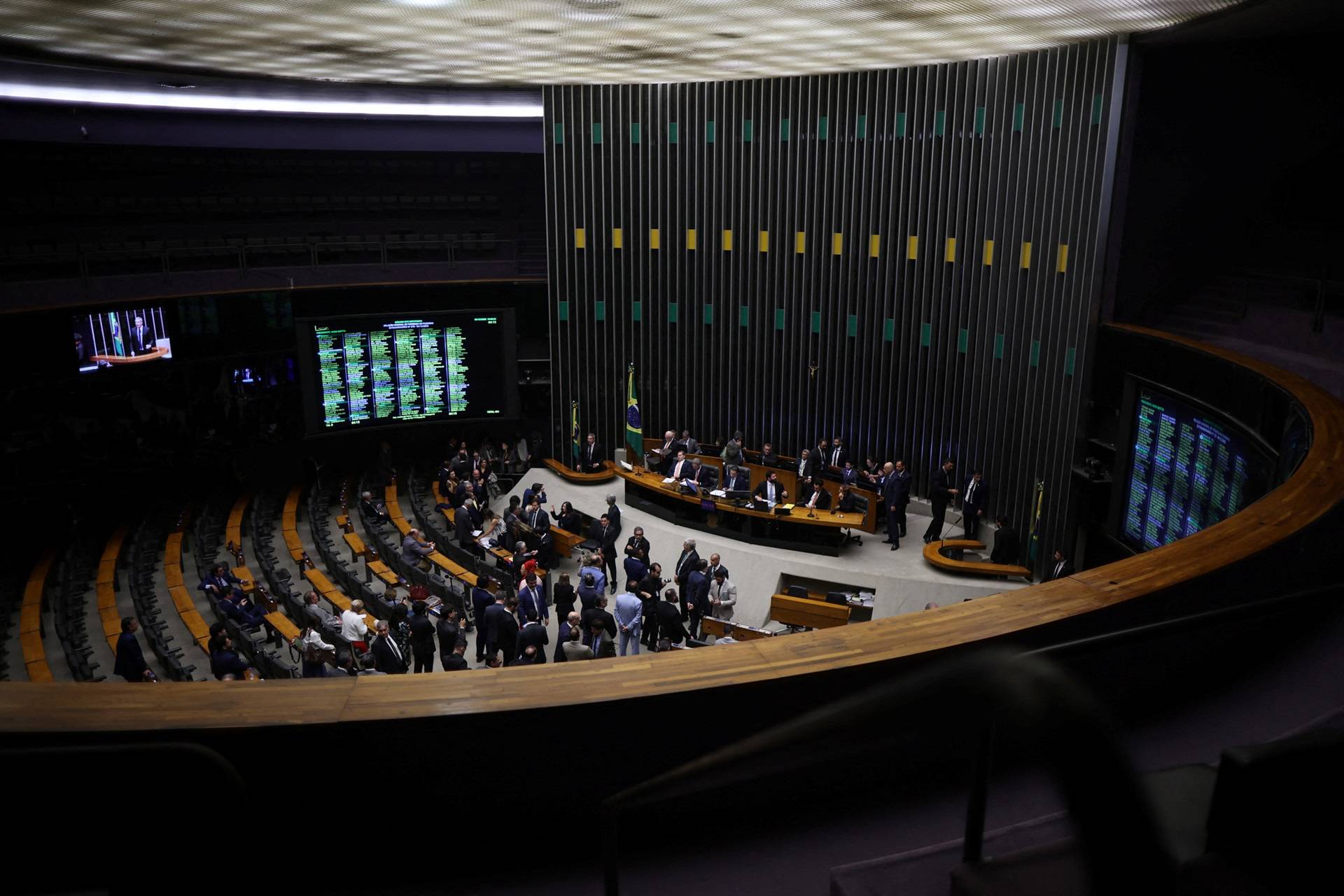 O presidente da Câmara dos Deputados, Hugo Motta, participa de uma sessão plenária da Câmara dos Deputados em Brasília, Brasil, em 9 de dezembro de 2025. REUTERS/Adriano Machado